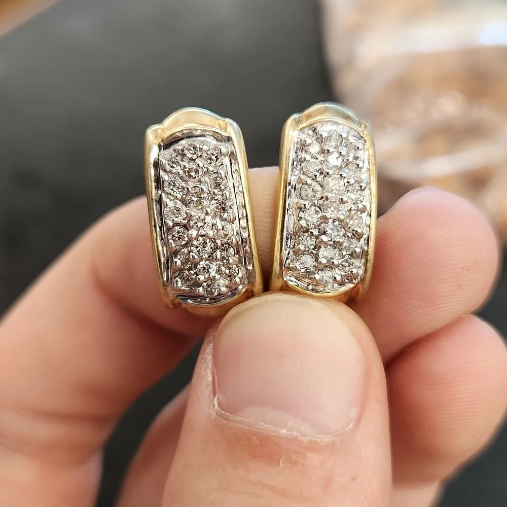 425111-10k yg diamond earrings